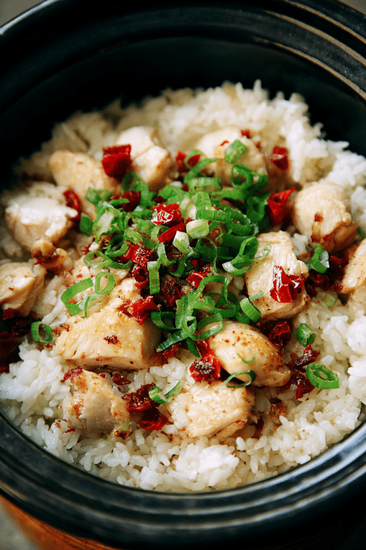 Chicken Recipe Rice Cooker – A Delicious Shortcut That Works Every Time 7 rice cooker with chicken, rice, and chopped green onions