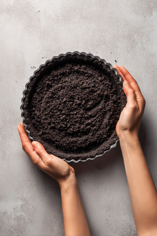 Mudpies Recipe That Will Melt in Your Mouth 8 Pressing Oreo crust into pie dish
